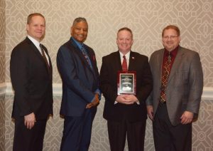 Pictured left to right: Kevin Kissling, Eastern National president and CEO; Calvin Wilson, Families of Flight 93 board member and family member of Flight 93 hero, LeRoy W. Homer, Jr.; Stephen Clark, superintendent of the National Parks of Western Pennsylvania; and David Wagner, EN Mid-Atlantic regional manager. Stephen accepted the Charles S. Marshall Unit Award on behalf of Flight 93 N MEM.