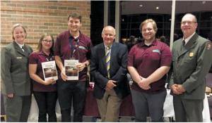 Pictured from left to right: Dr. Susan Trail, Antietam National Battlefield superintendent; Hunter Parrish, EN store associate; Graham Blair, EN store associate; Dr. Edward Linenthal, author of Sacred Ground: Americans and Their Battlefields; Cullen Byers, EN store associate; and Keith Snyder, Antietam National Battlefield chief of resource education and visitor services at the first of three lectures held during the Antietam National Cemetery lecture series. Photo courtesy NPS.